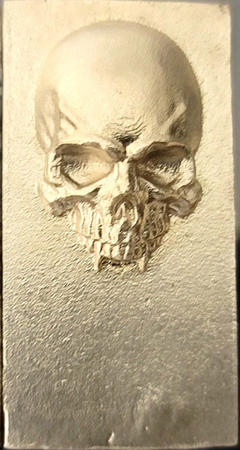 2025 Kannibal Skull Bar in matte finish, 1 oz .999 fine silver, front view with raised skull design