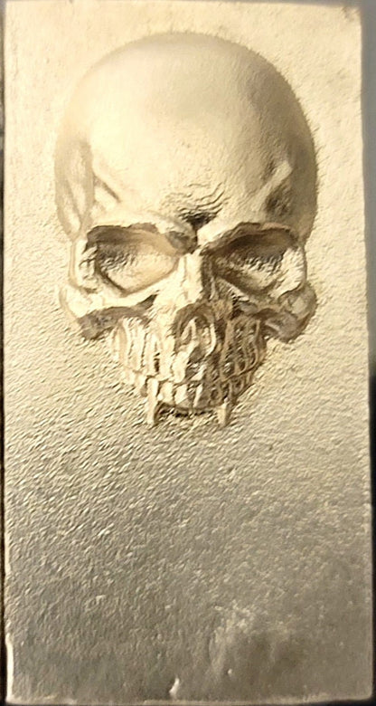 2025 Kannibal Skull Bar in matte finish, 1 oz .999 fine silver, front view with raised skull design