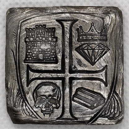 Kannibal Hektor Coat of Arms Crest in .999 fine silver, showing castle, crowned diamond, skull, bullion bars, and inverted cross