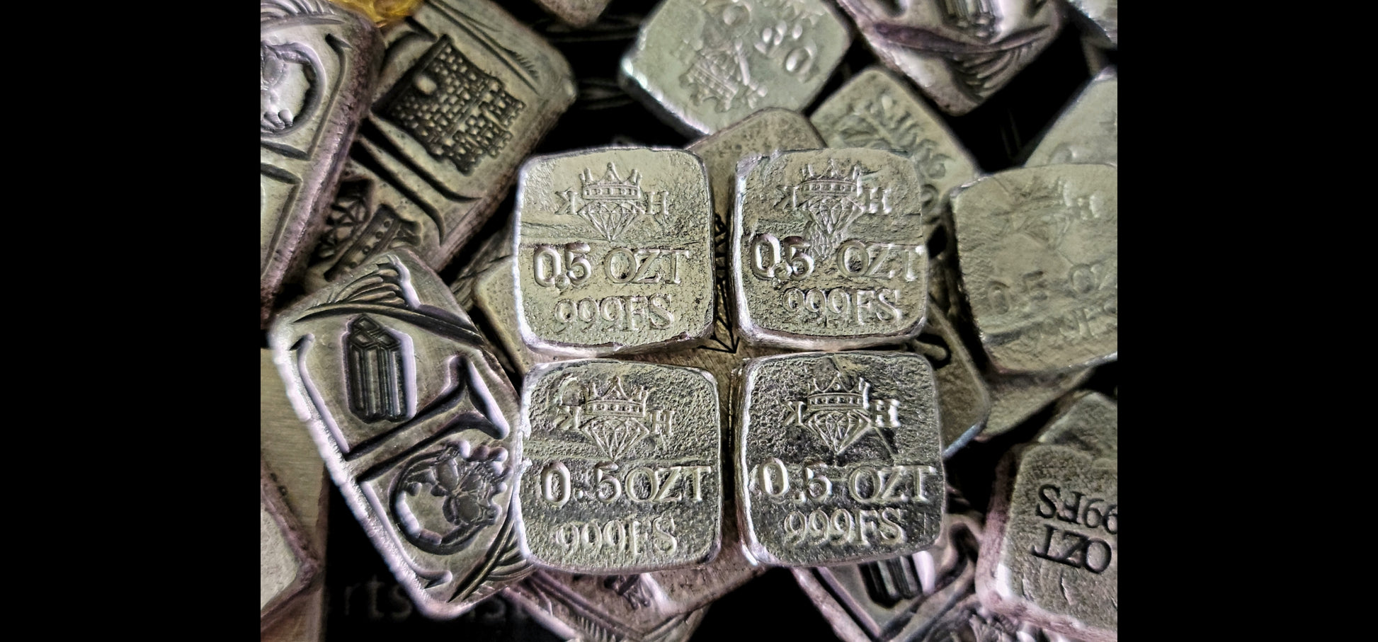 Reverse of Kannibal Crest Pieces Fractional Set V.2, four 0.5 oz .999 fine silver pieces showing crowned diamond KH maker’s mark and weight stamps
