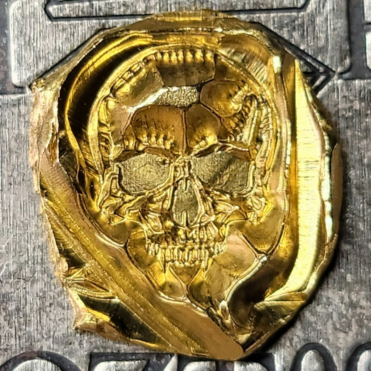 Kannibal Crest Gold Fractional, one-of-one 2.7 gram .999 fine gold piece with raised vampiric skull design